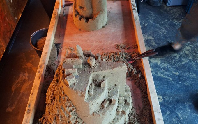 Zand bouwen met collega’s